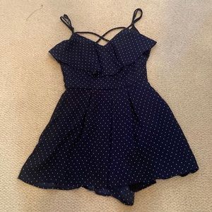 Francesca’s navy poka dotted romper